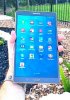 Galaxy Tab S 84 in hand bright cloudy day reduced.jpg