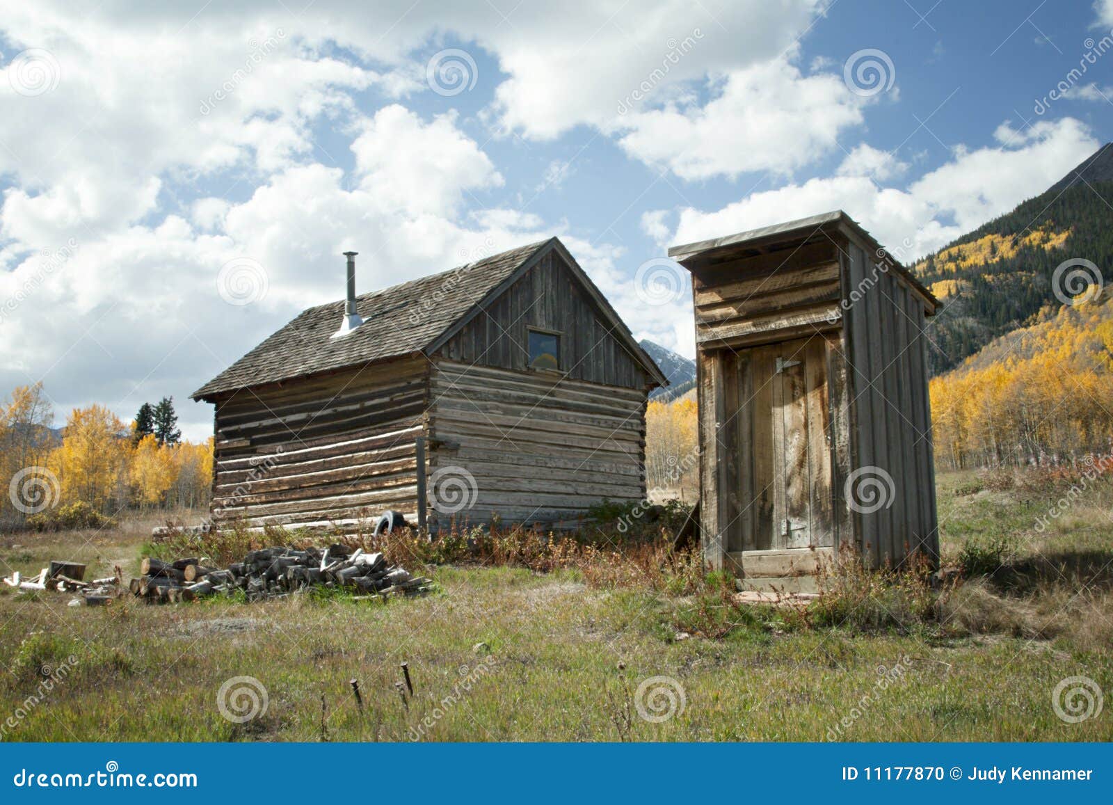 rustic-old-cabin-outhouse-fall-season-11177870.jpg